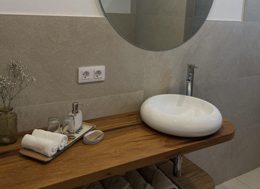 Toilet with washbasin and mirror