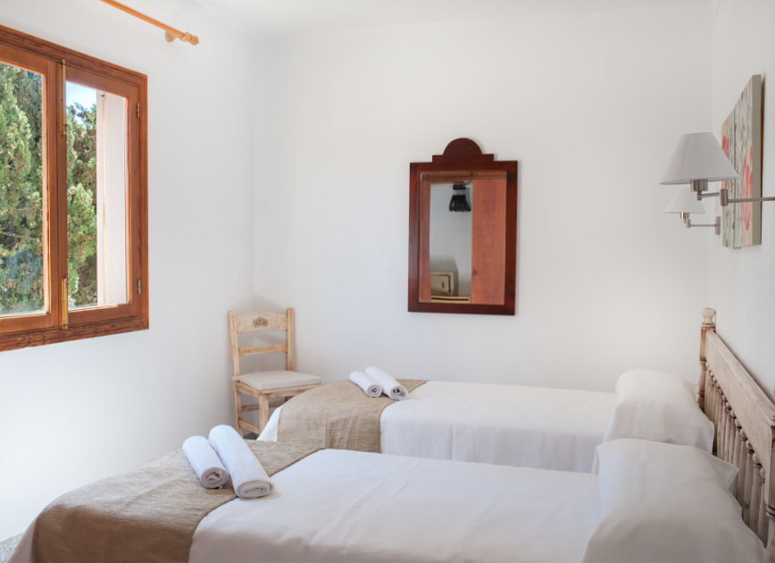 Bedroom in the apartmet with two single beds