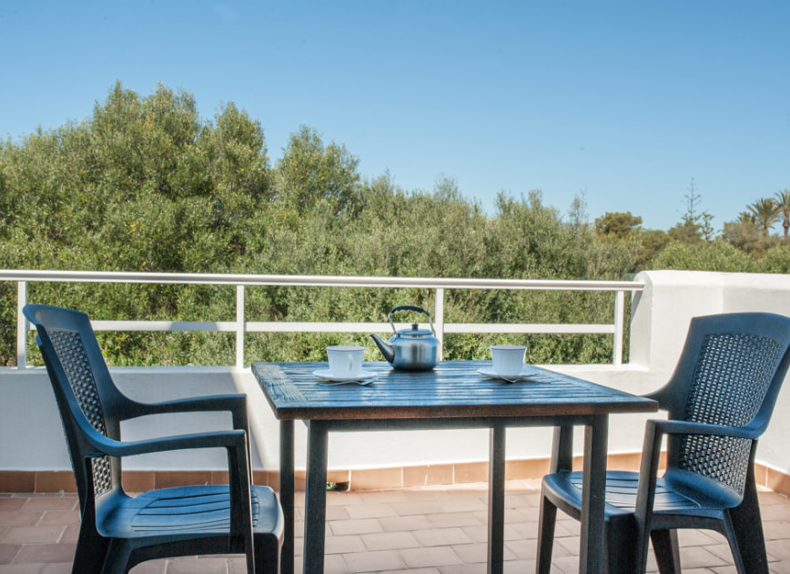 Terrace of the apartment with outdoor furniture